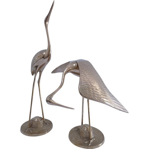 Pair of stilt-walkers in solid brass, 1980