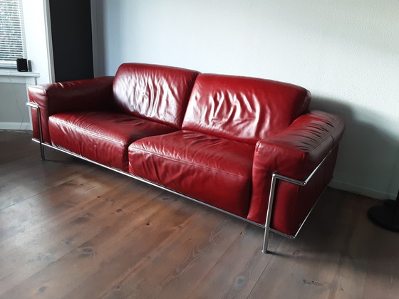 Image 1 of Natuzzi Italian leather design sofa with lounge pouf ACTION!!