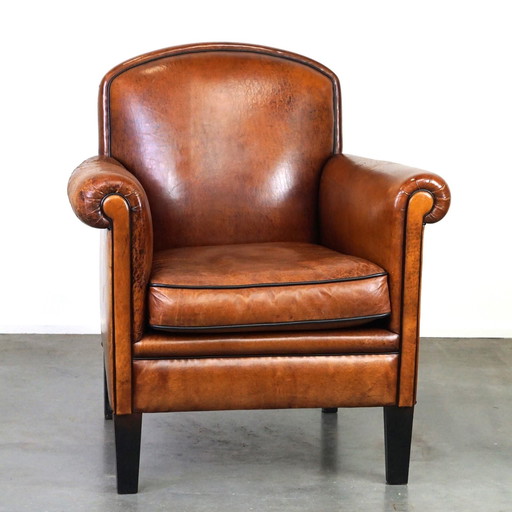 Vintage sheep leather armchair/ designer armchair