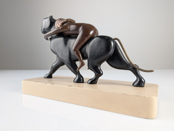 Image 1 of Ariadna y la pantera, escultura Art Déco en madera y latón, década de 1920