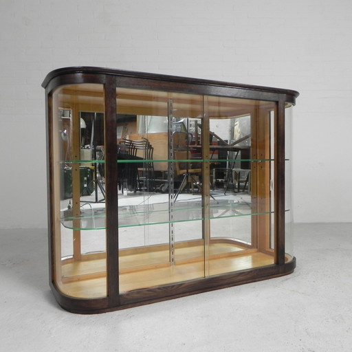 Art Deco Display Case With Curved Glass And Glass Sliding Doors, 1950s