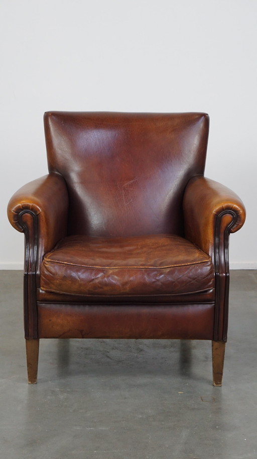 Fauteuil en cuir de mouton marron