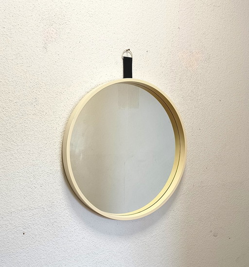 Miroir rond des années 70 avec bord blanc