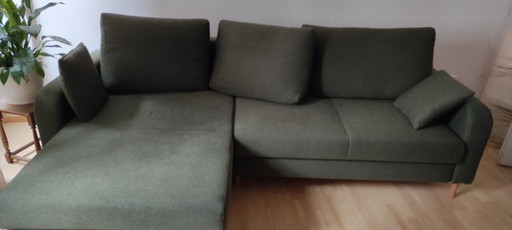 Corner sofa with sleeping function