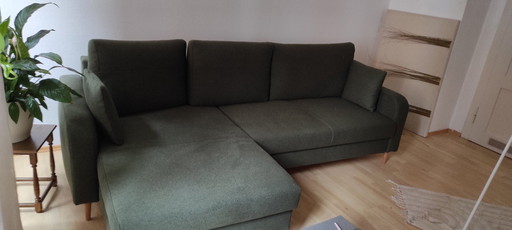 Corner sofa with sleeping function