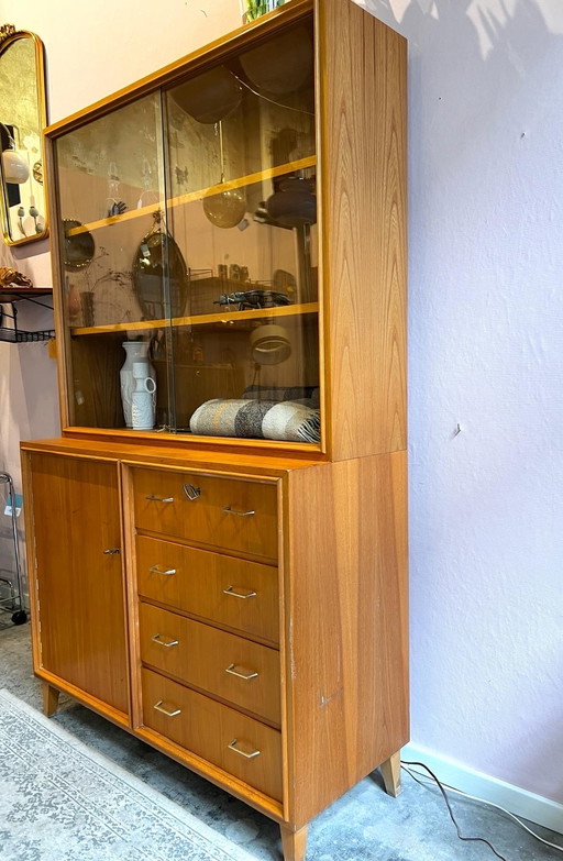 1950s display case with drawers and door