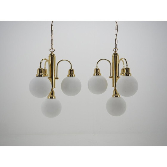 Image 1 of Pair of vintage glass and brass chandeliers with globes, Czechoslovakia