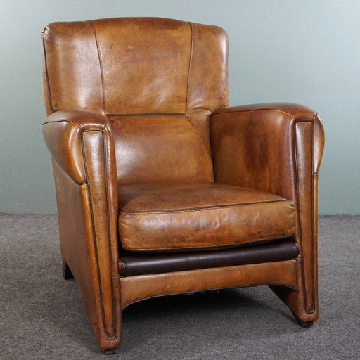 Modern designer armchair made of sheep leather