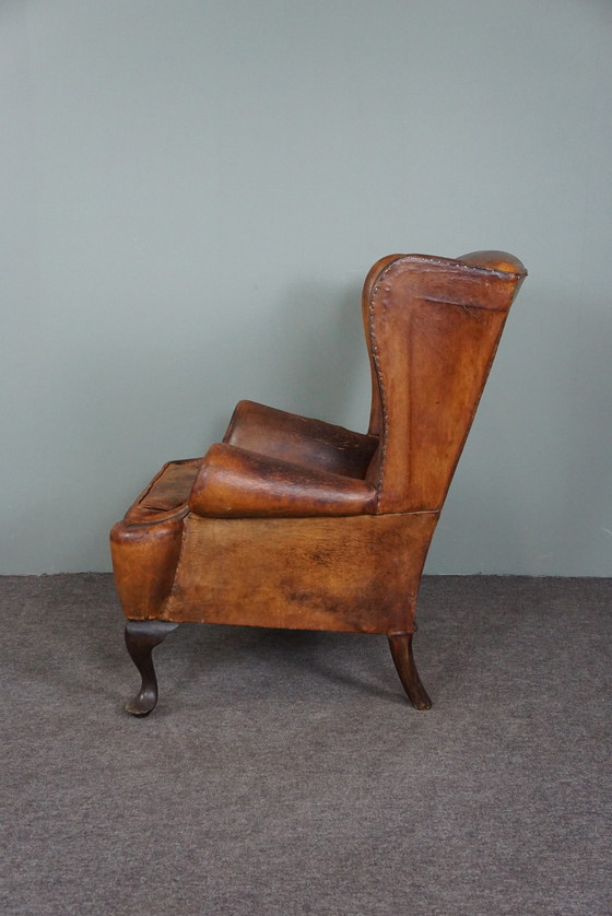 Image 1 of Fauteuil à oreilles en peau de mouton