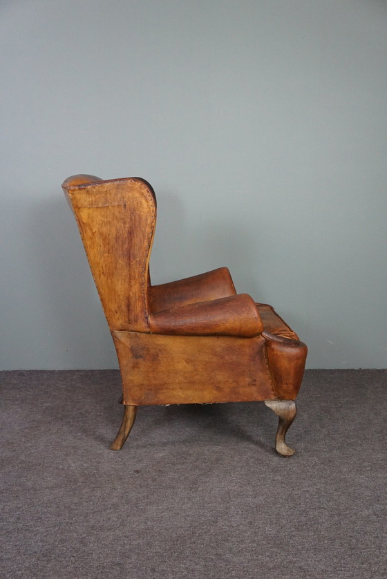 Image 1 of Fauteuil à oreilles en peau de mouton