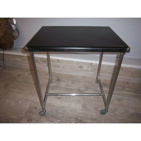 Image 1 of Vintage side table in steel with wheels