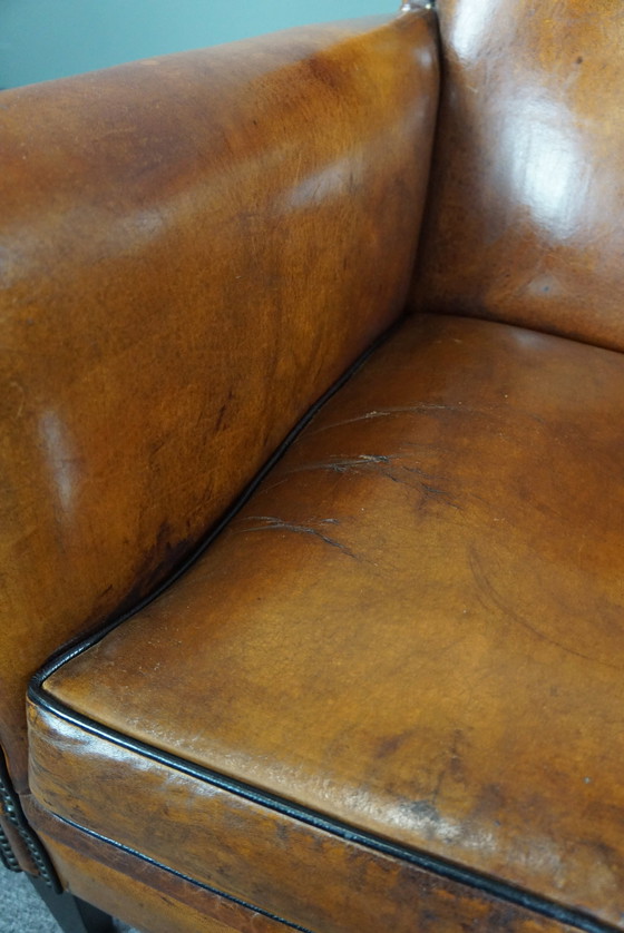 Image 1 of Art Deco armchair with black piping and decorative nails