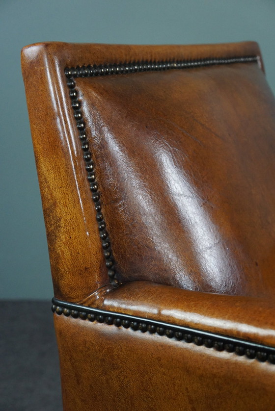 Image 1 of Art Deco armchair with black piping and decorative nails