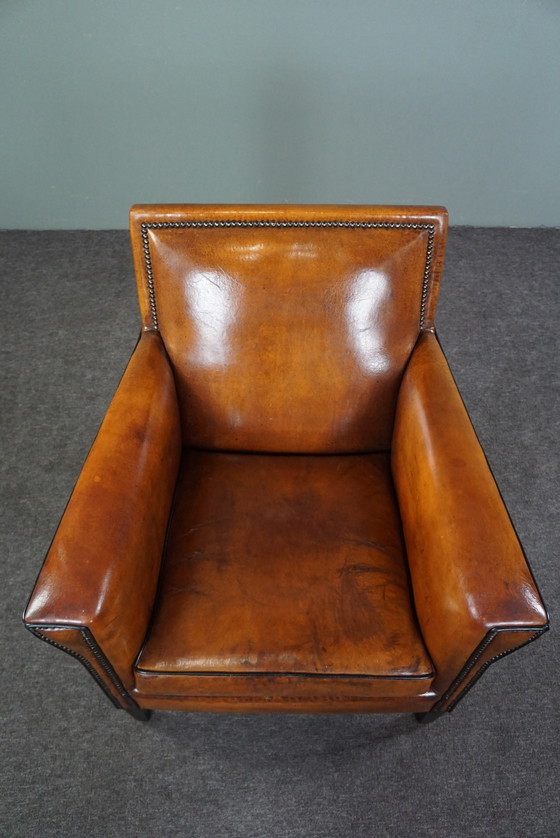 Image 1 of Art Deco armchair with black piping and decorative nails