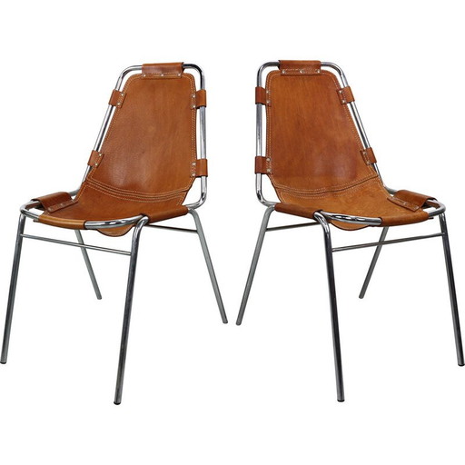 Pair of vintage bar stools in chromed tubular metal and leather by Charlotte Perriand for Les Arcs, 1960