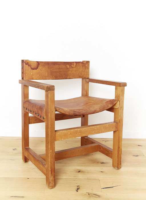 Armchair made of solid pine wood and saddle leather from Biosca