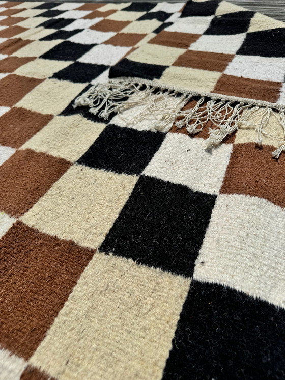 Image 1 of Checkered rug