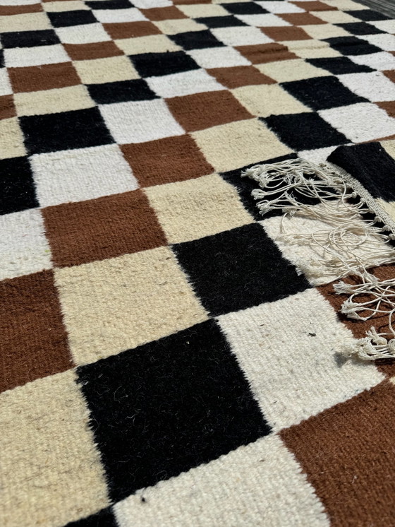 Image 1 of Checkered rug