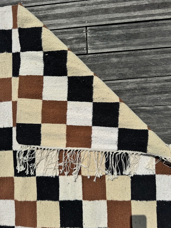 Image 1 of Checkered rug