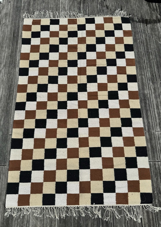 Image 1 of Checkered rug