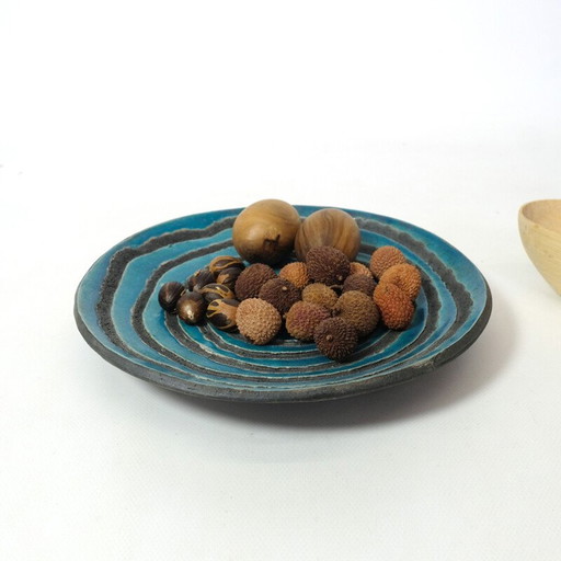Vintage dish in Santorini lava stone, 2010