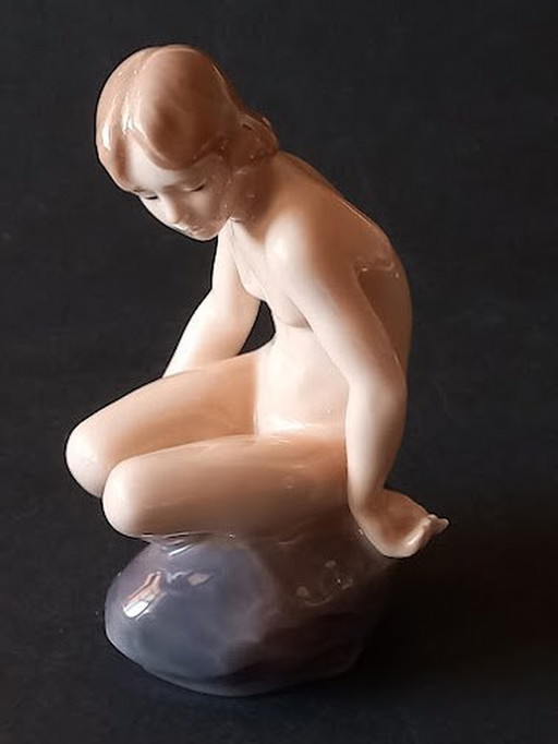 Royal Copenhagen 'Girl on Stone' by Ada Bonfils