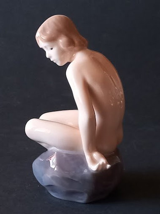 Royal Copenhagen 'Girl on Stone' by Ada Bonfils