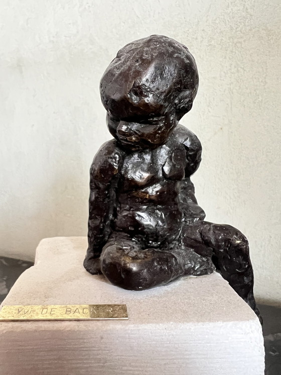 Image 1 of Yvi De Backer seated child