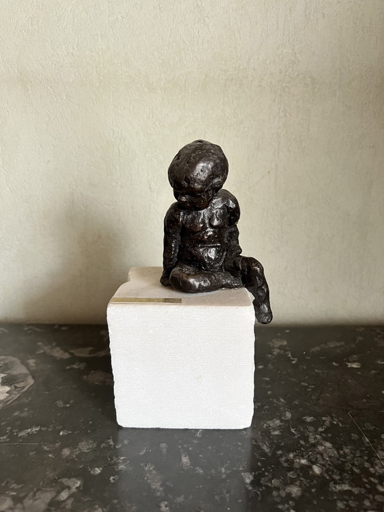 Image 1 of Yvi De Backer seated child