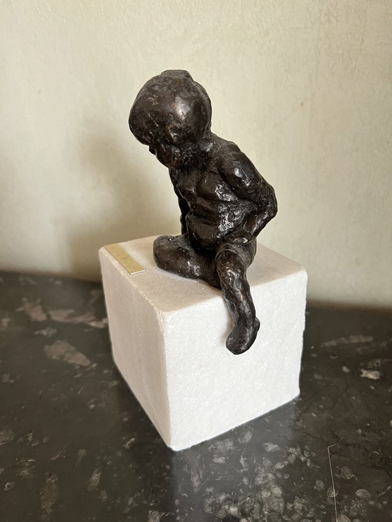 Image 1 of Yvi De Backer seated child