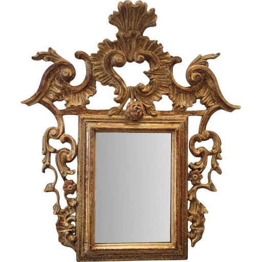 Specchio d'epoca con cornice in legno intagliato e dorato