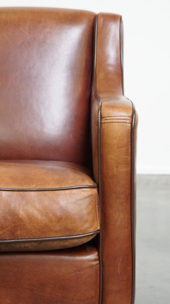 Image 1 of Sheepskin Armchair With Dark Brown Piping