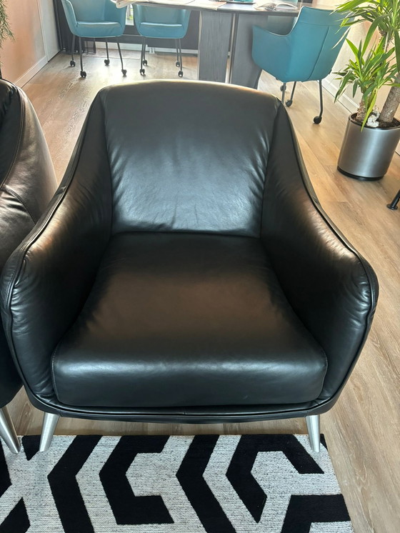 Image 1 of Two Black Leather Armchairs