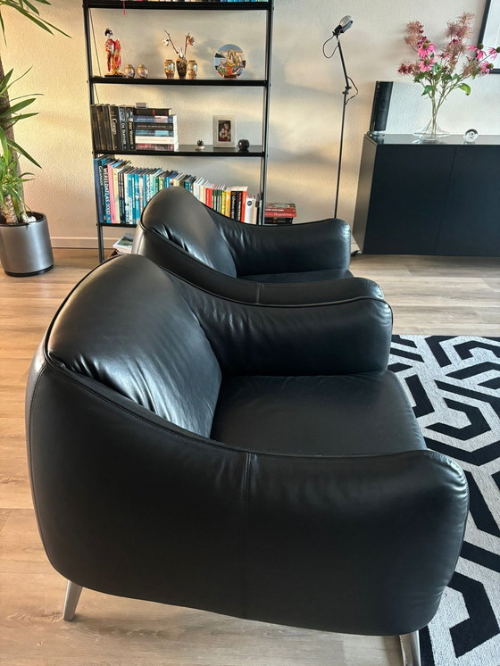 Image 1 of Two Black Leather Armchairs