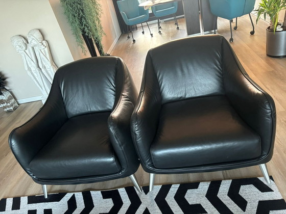 Image 1 of Two Black Leather Armchairs