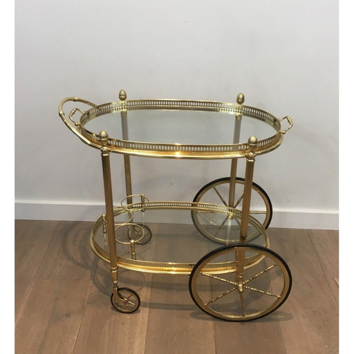 Vintage oval brass rolling table by Maison Baguès, 1940