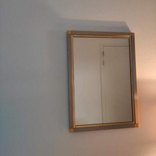 Mirror In Frame Of Brass And Metal