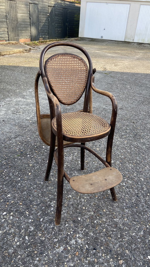 Antique Thonet high chair bentwood with webbing with table