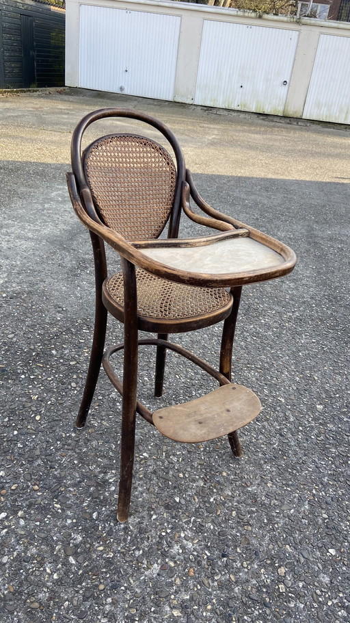 Antique Thonet high chair bentwood with webbing with table