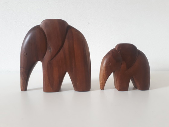 Image 1 of set 70s teak elephants