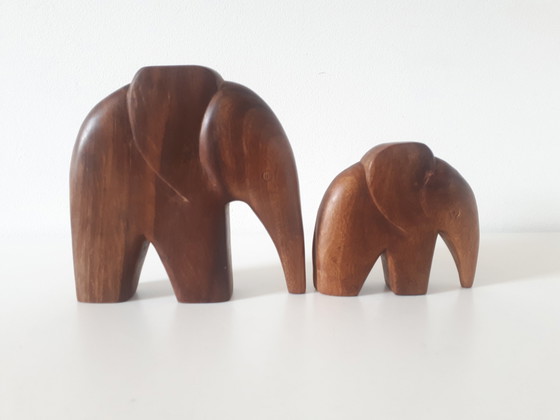 Image 1 of set 70s teak elephants