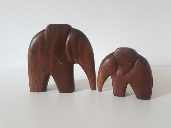 Image 1 of set 70s teak elephants