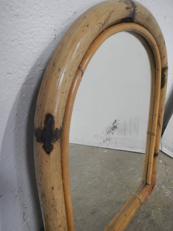 Image 1 of Rounded Top Wicker Mirror. 1960