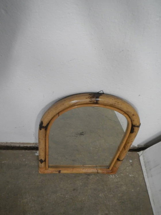 Image 1 of Rounded Top Wicker Mirror. 1960