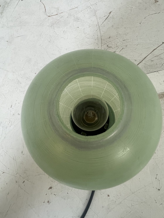 Image 1 of Atomic Age / Mid Century Modern - Tripod lamp with green glass shade on brass feet