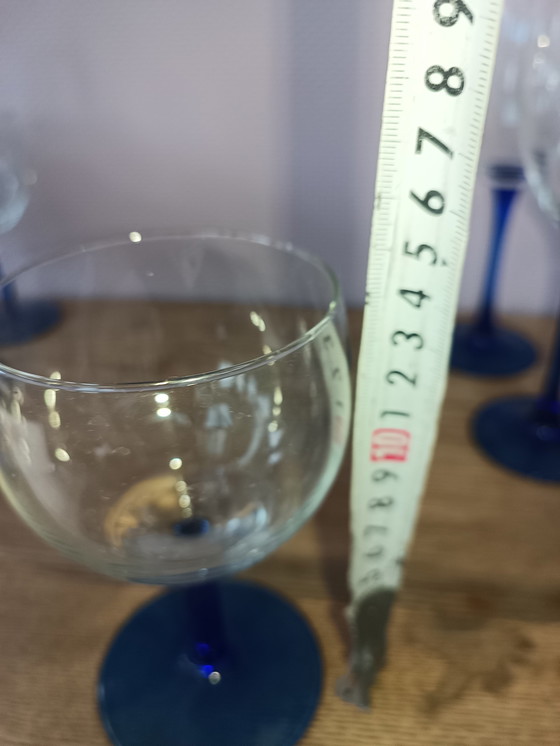 Image 1 of 17x Luminarc wine glasses with blue bases