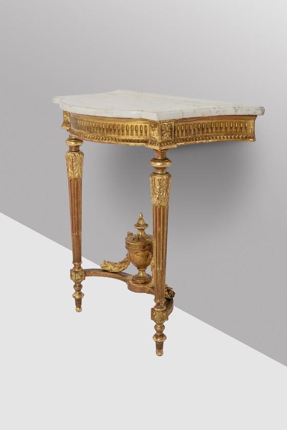 Image 1 of Carved and gilded wood console with marble top. Circa 1880.