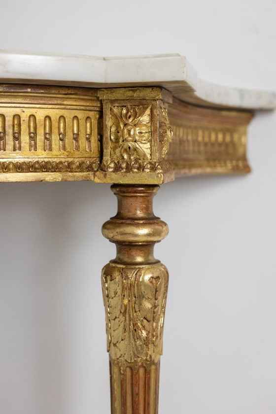 Image 1 of Carved and gilded wood console with marble top. Circa 1880.