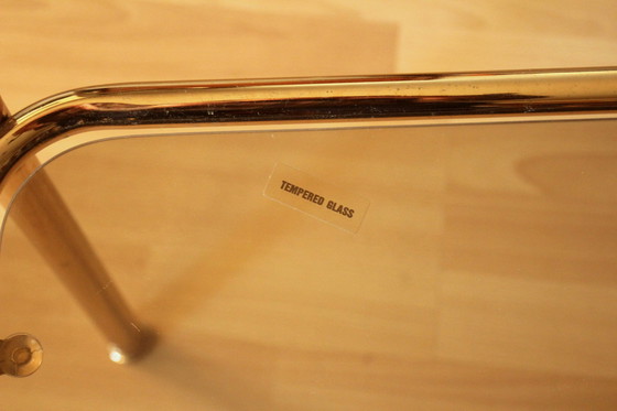 Image 1 of Tavolino laterale in ottone con piano in vetro fumé - Vintage