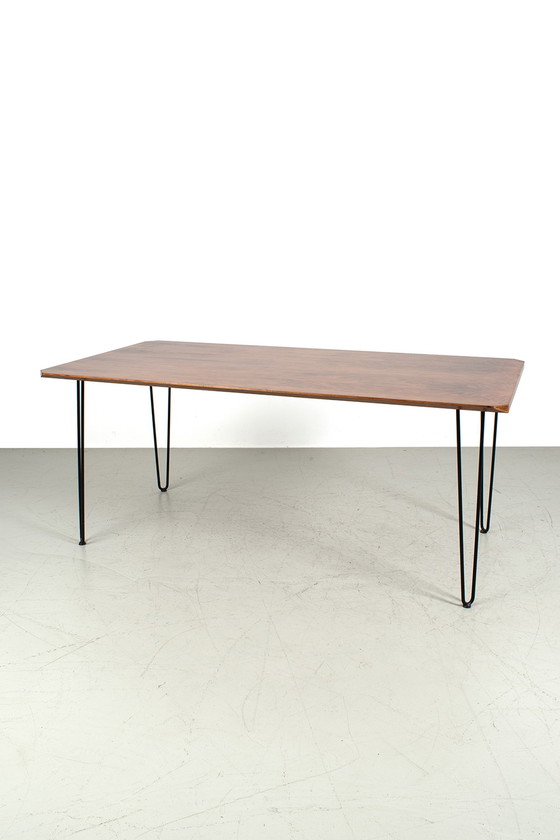 Image 1 of Table de salle à manger avec pieds en boucle